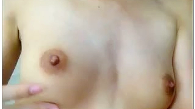 Hot Japanese Sweetheart Showing Off Her Sexy Tits