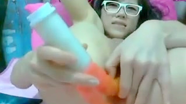 Shy Webcam Asian Gets Kinky Stuffing Her Pussy with Dildo Toys