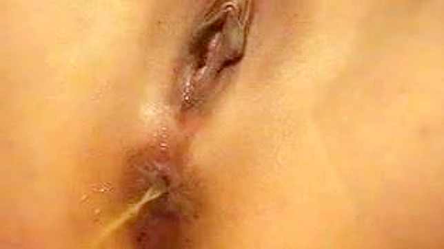 Bold Japanese Beauty Teases Her Smooth Pussy Solo