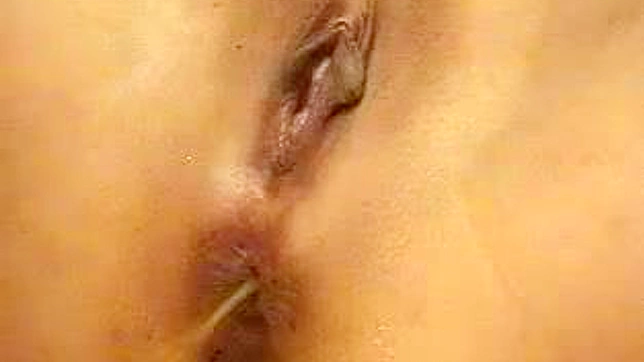 Bold Japanese Beauty Teases Her Smooth Pussy Solo