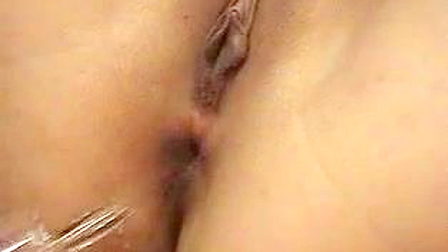 Bold Japanese Beauty Teases Her Smooth Pussy Solo