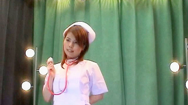 Seductive Redhead Nurse Teases in White Uniform Showdown