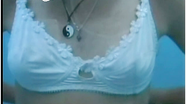 Cute Ty Babe Shows Her Hooters Under White Bra Seductively