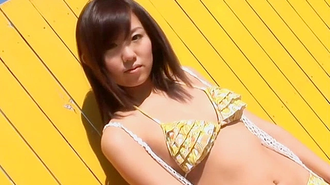 Petite Japanese Babe Teases With Her Irresistible Round Ass