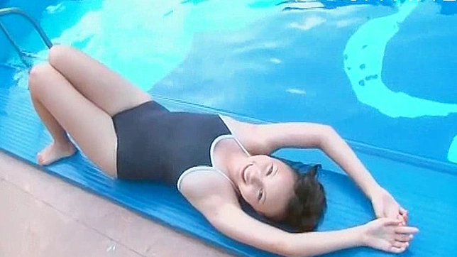 Adorable Asian Model Poses Seductively Teasing Viewers Eagerly Desiring More