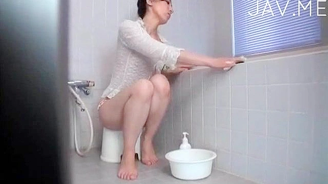 Seductive Dark-Haired Japanese Coaxing Thick Cock into Her Mouth