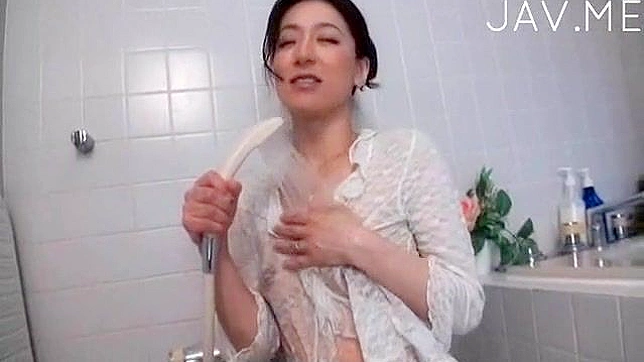 Seductive Dark-Haired Japanese Coaxing Thick Cock into Her Mouth