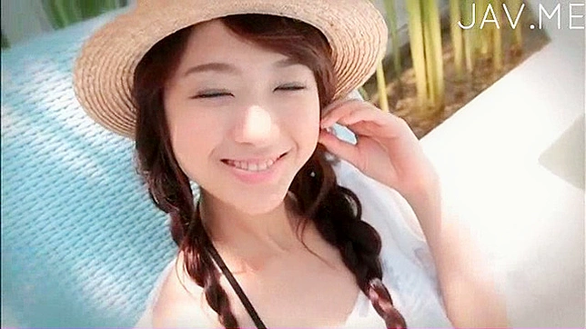 Sultry Beauty Sunbathing While Showcasing Her Curves Seductively