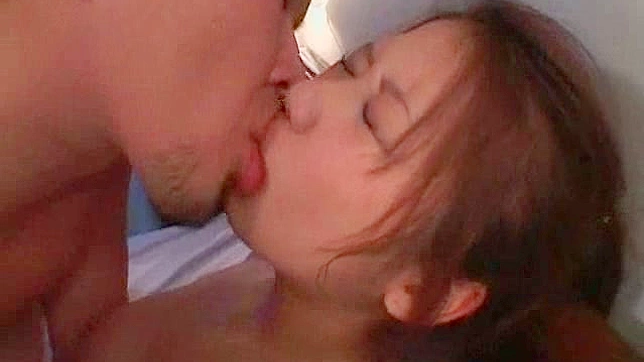 Daring Japanese Beauty Gives Deep Blowjob & Spreads Wide