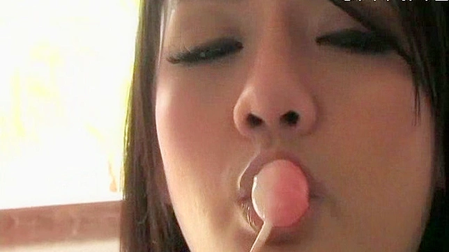 Seductive Brunette Displays Big Boobs Under Transparent Top