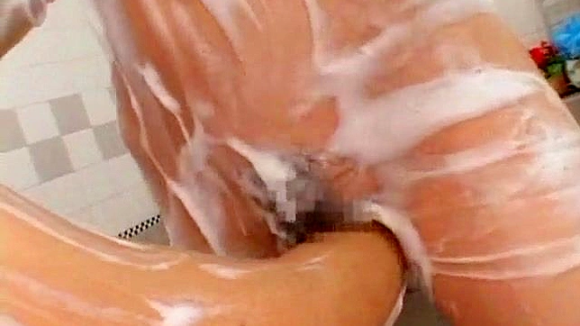 Sultry Beauty Lathers Her Body Before Riding Him Hard