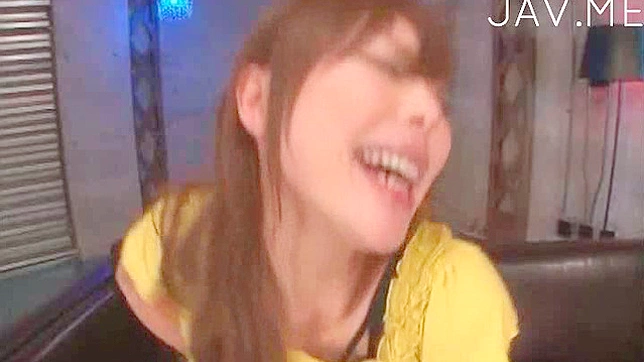 Seductive Japanese Brunette Charms While Skillfully Sucking Cock