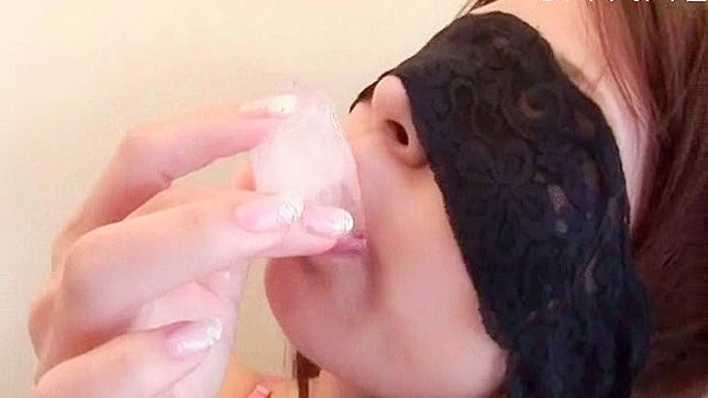 Sultry Asian Beauty Gets Wet While Licking Candy Seductively