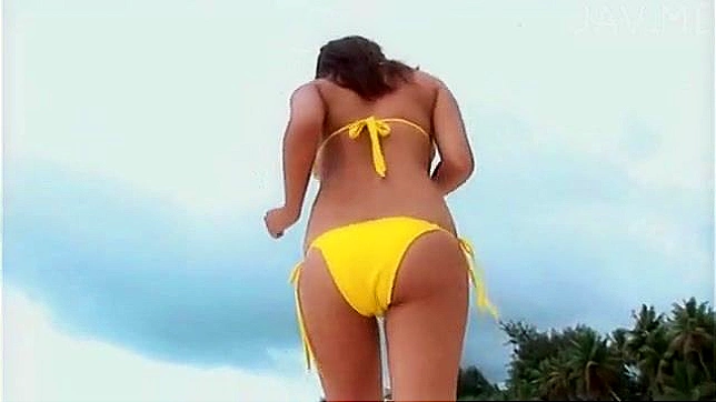 Lovely Asian Chick in Sexy Bikini Teases at Sensual Beach Outing