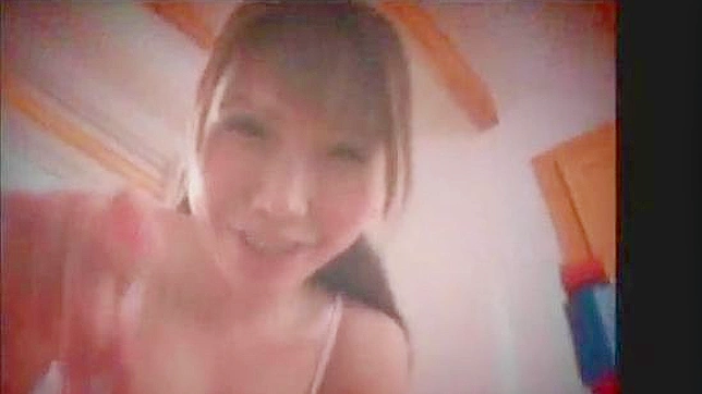 Seductive Asian Temptress Teases With Big Boobs In Kitchen