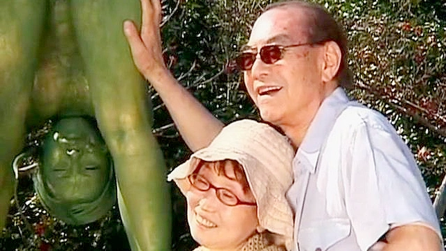 Outdoor Public Sex Scene with Vibrant Painted Statues