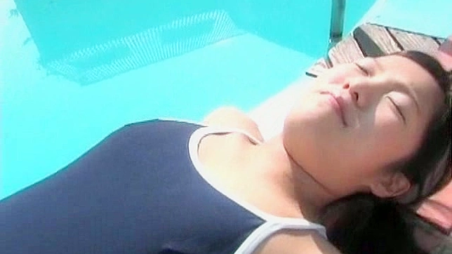 Sexy Japanese Babe Shows Off Her Juicy Pussy Print in Swimsuit