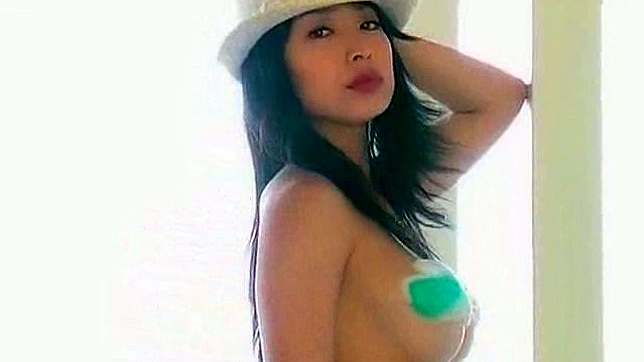 Seductive Eurasian Chick Teasing Her Wet Pussy Close-Up