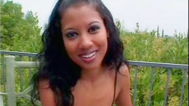 Seductive Kitty Reveals Curves Through Sultry Erotic Dance