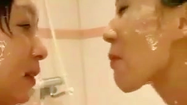 Slippery Lesbians Playfully Fuck Each Other In The Tub