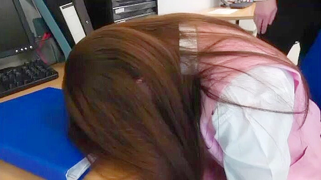 Seductive Japanese Secretary Tempts Colleague in Office Tryst