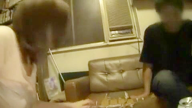 Buzzed Asian Couple Enjoying Passionate Bedtime Fun