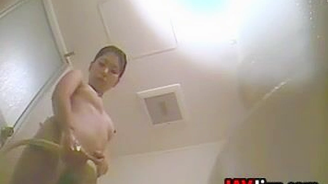 Naughty Japanese Babe Caught Showering & Exposed Live