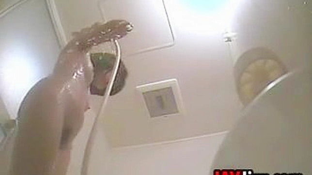Naughty Japanese Babe Caught Showering & Exposed Live