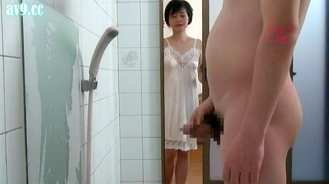 Caught! Mature Japanese Mom Enjoys Steamy Shower with Son's Friend