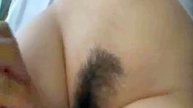 Seductive Asian MILF Drenched in Desire for Steamy Sex