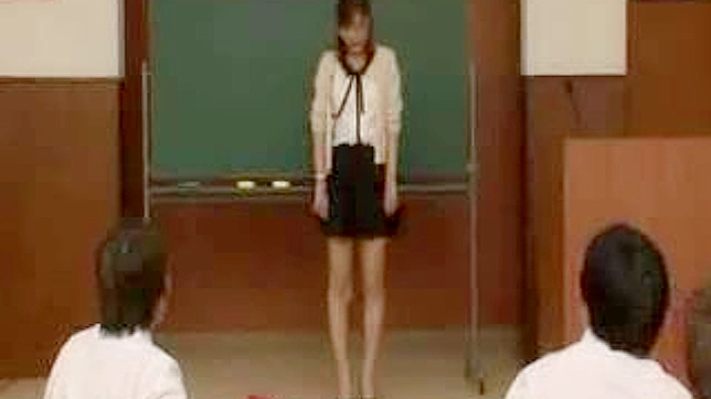 Seductive Teacher Reveals Her Body to Eager Students