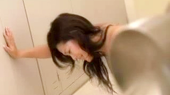 Seductive Oriental MILF Teacher's Steamy Locker Room Encounter