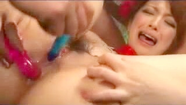 Lesbian Trio from Japan Engages in Passionate Toy Fun