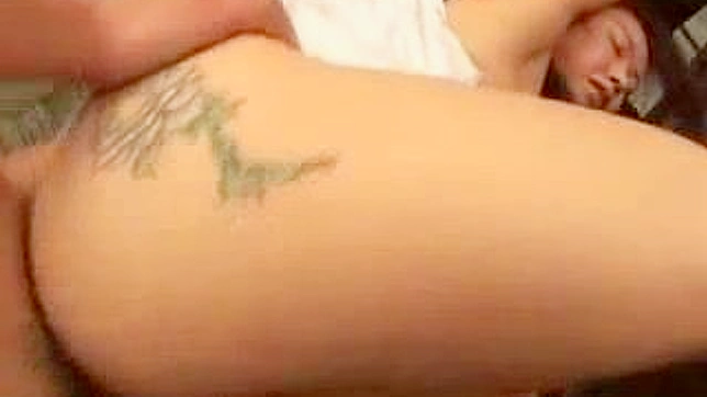 Smooth Haired Asian Beauty Rides Cock in Steamy Sex Scene