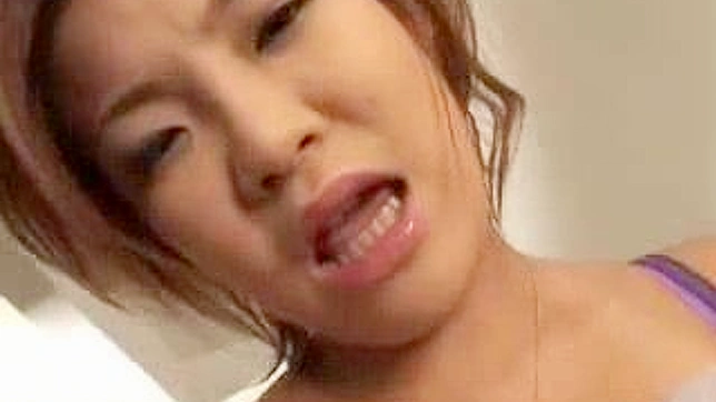 Seductive Oriental Woman Masturbating Sensually with Toys