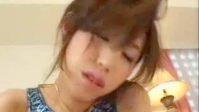 Asian Bombshell Ignites Passion with Her Seductive Giant Toy