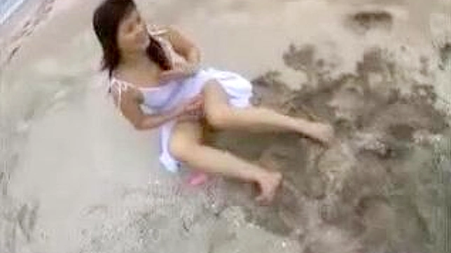 Japan Beach Beauty Wanks Off Two Guys Intensely