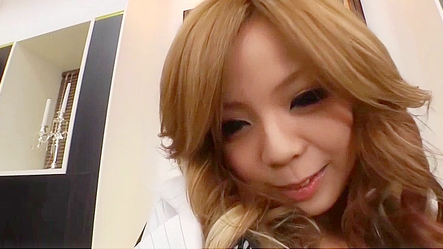 Hot Japanese Office Worker Receives Steamy Handjob from Boss
