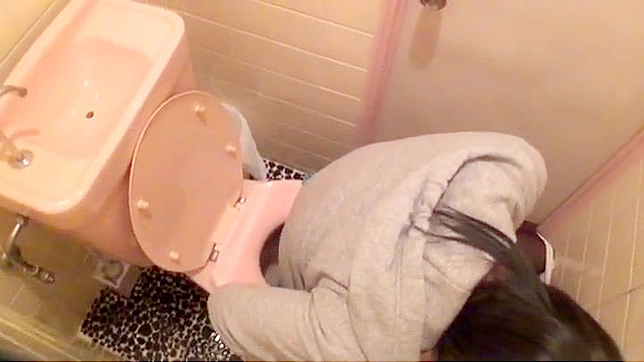 Sneaky Japanese MILF Masturbates Secretly Behind Closed Doors