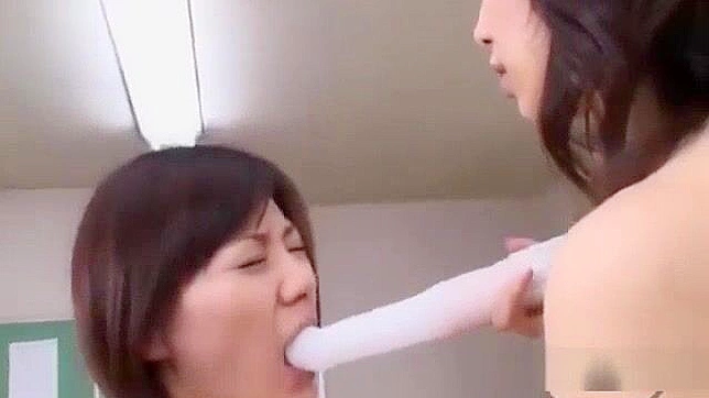 Seductive Japanese Teacher Teases Student With Vibrator On Desk