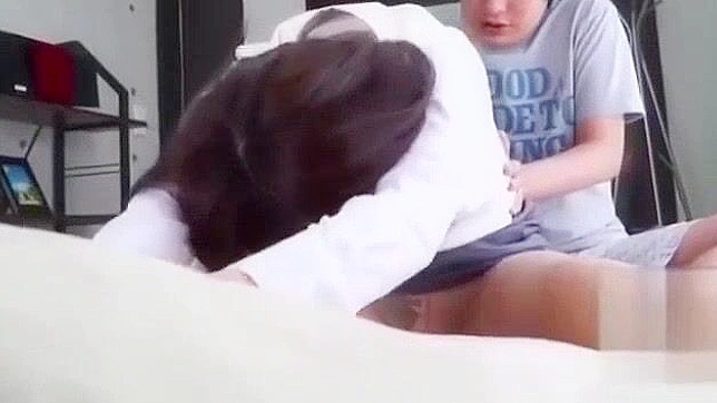 Pretty Japanese Teacher Helps Student Learn New Tricks