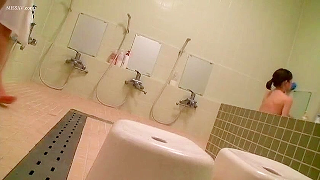 Japanese Babe Shows Off Hot Body In Steamy Public Shower