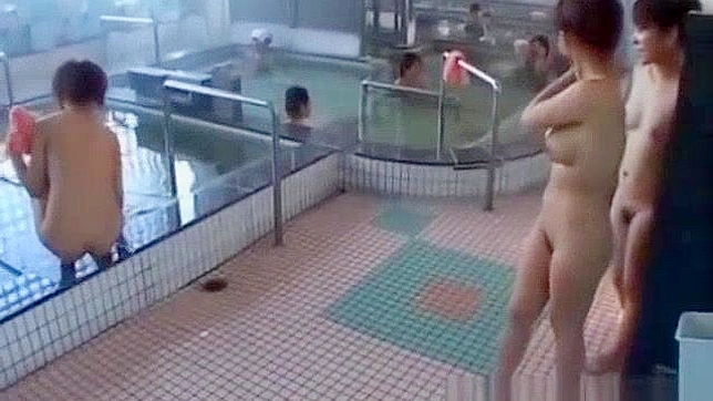 Seductive Japanese Babe Tempts at Hot Spring Massage