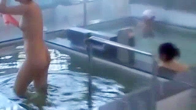 Seductive Japanese Babe Tempts at Hot Spring Massage