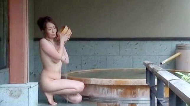 Sizzling Japanese Babe Teases With Her Seductive Big Tits