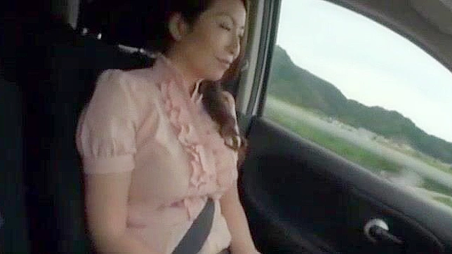 Sizzling Japanese Babe Teases With Her Seductive Big Tits