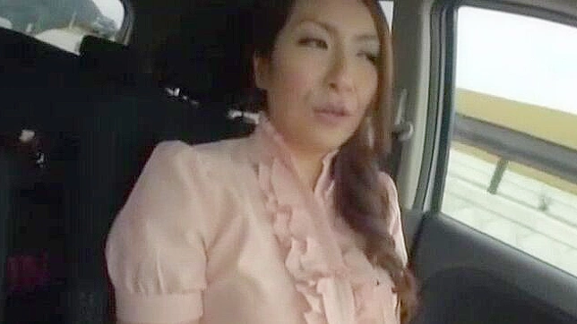 Sizzling Japanese Babe Teases With Her Seductive Big Tits