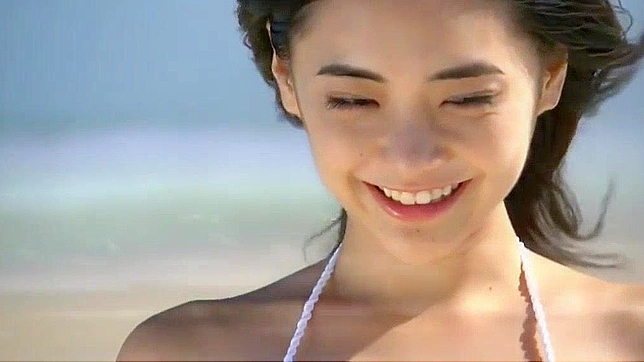 Kurashina Kana Seduces in White Bikini for Steamy Action!