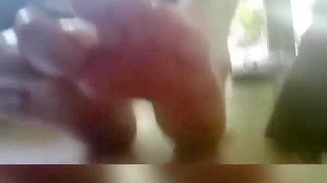 Sultry Japanese Babe Tempts With Oil-Covered Feet and Footjob