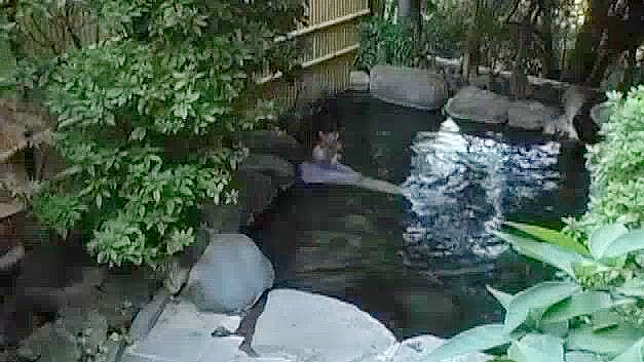 Sultry Japanese Babe Gives Hot Showerside Handjob Action